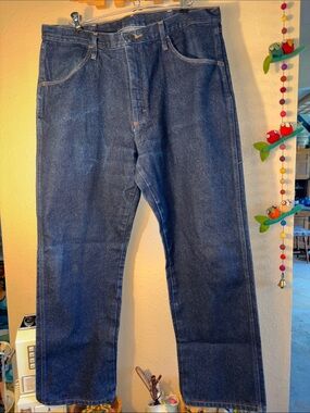 EUC RUSTLER dark blue straight, relaxed leg blue jeans size 38 x 29.